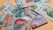 Billetes mexicanos de distintas denominaciones.