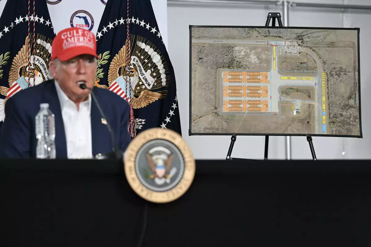 US President President Donald Trump visits a detention center located in the Florida Everglades