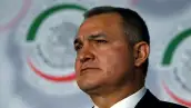FILE PHOTO: Mexico's Public Security Minister Genaro Garcia Luna attends a meeting with the Human Rights commission at the Senate in Mexico City