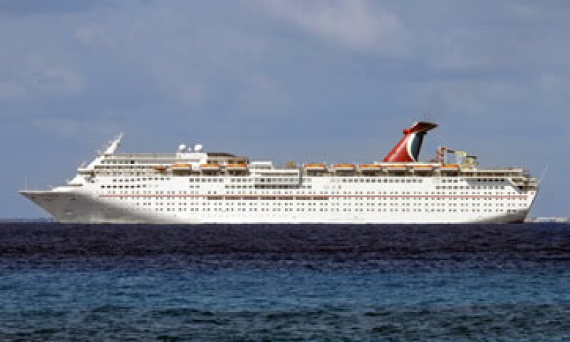 Los turistas del Carnival Magic desembarcaron en Honduras, pero se le negó el permiso en Belice y México. (Foto: Cuartoscuro )