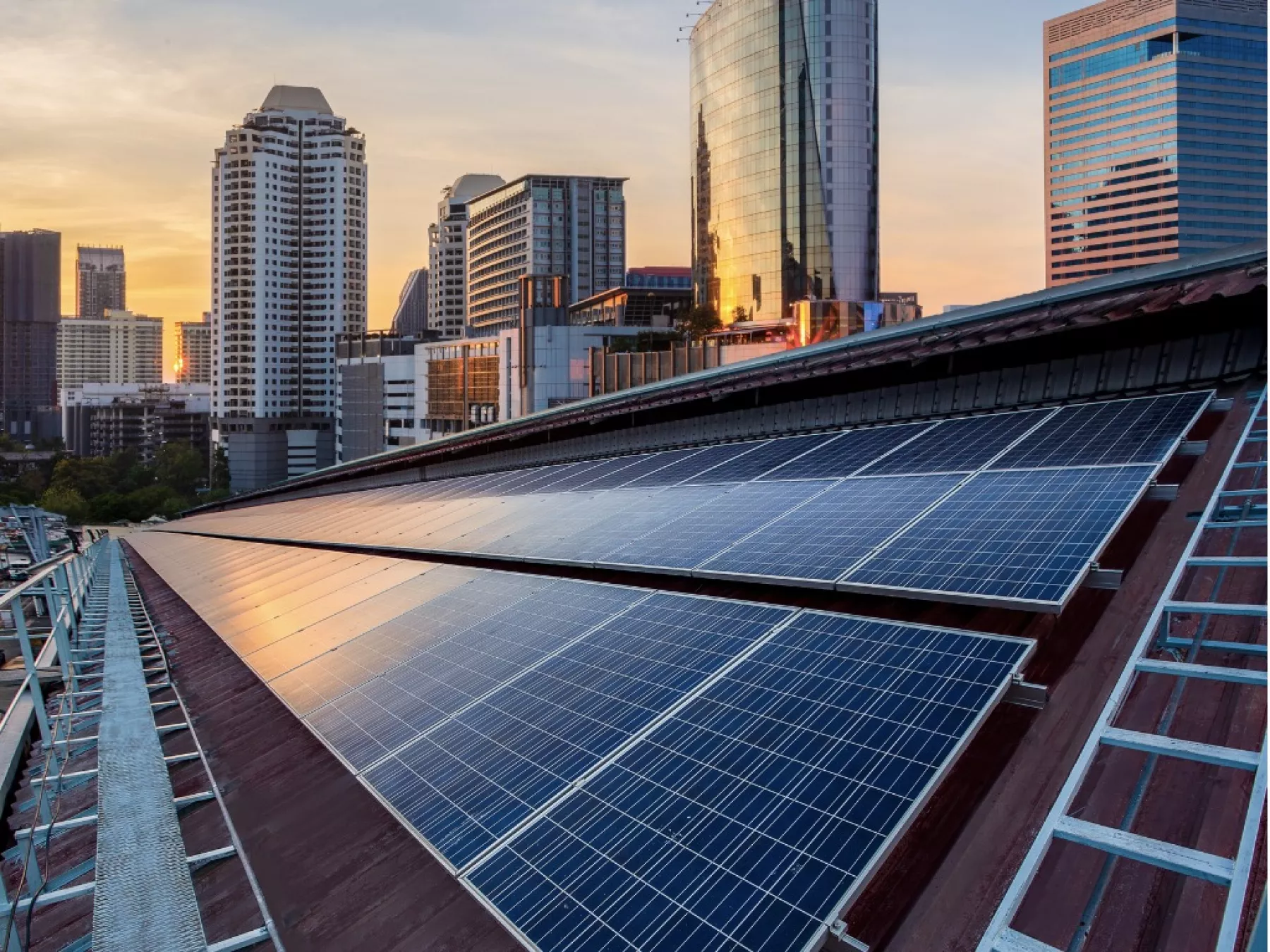 solar-panel-photovoltaic-installation-on-a-roof-of-factory-sunny-blue-picture-id1138203628 (1).jpg