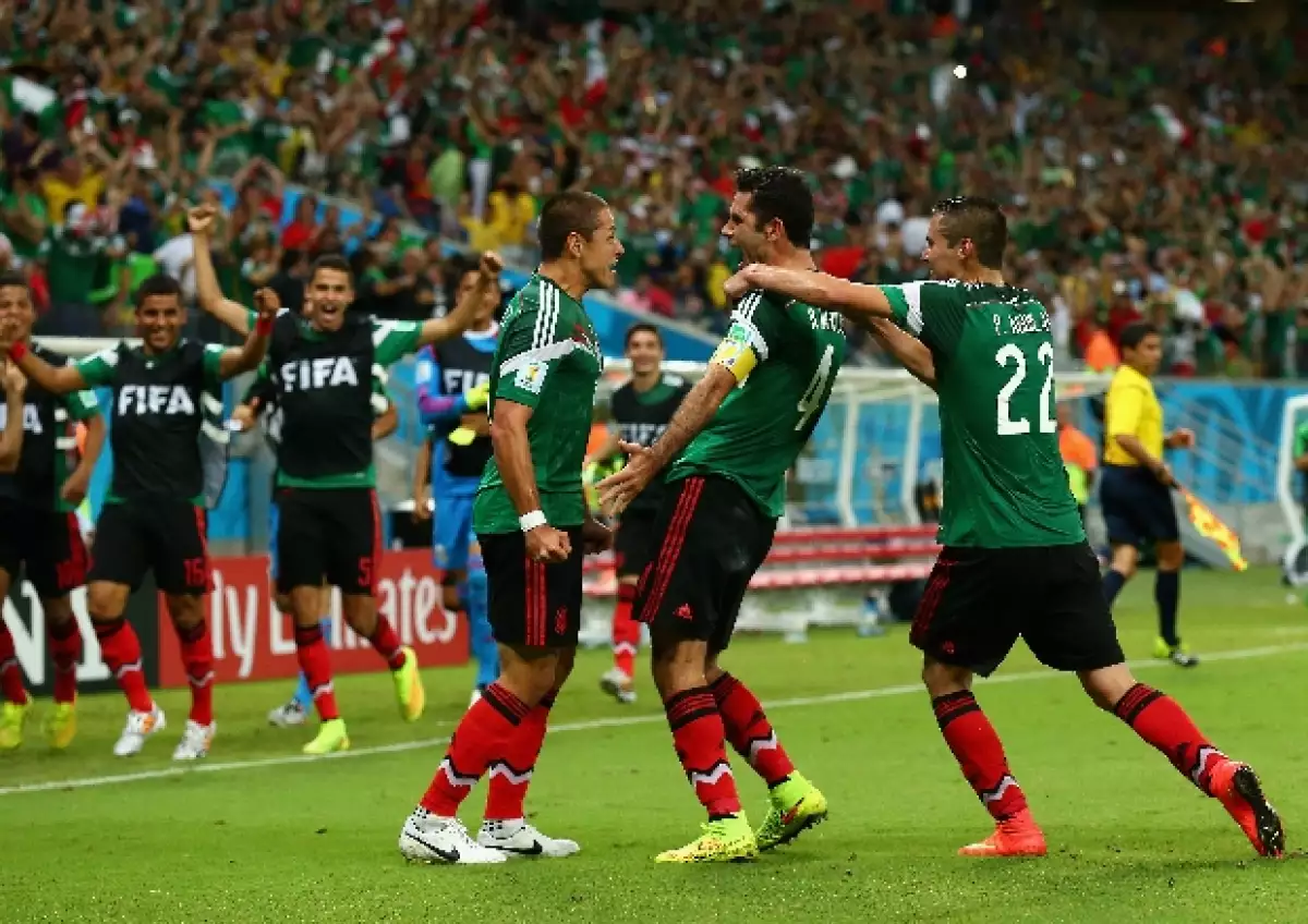 Rafa festejando instantes después de haber anotado el primer gol contra Croacia durante el partido de este 23 de junio en Brasil 2014.
