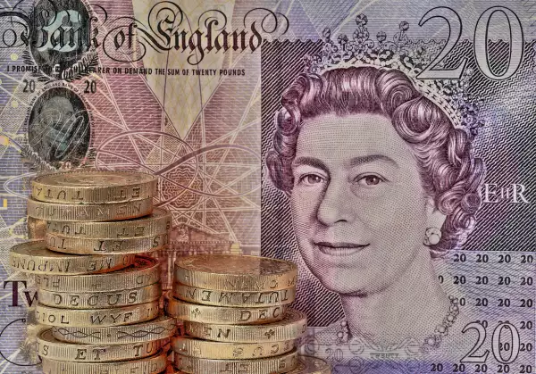 British Pound Coin & £20 note