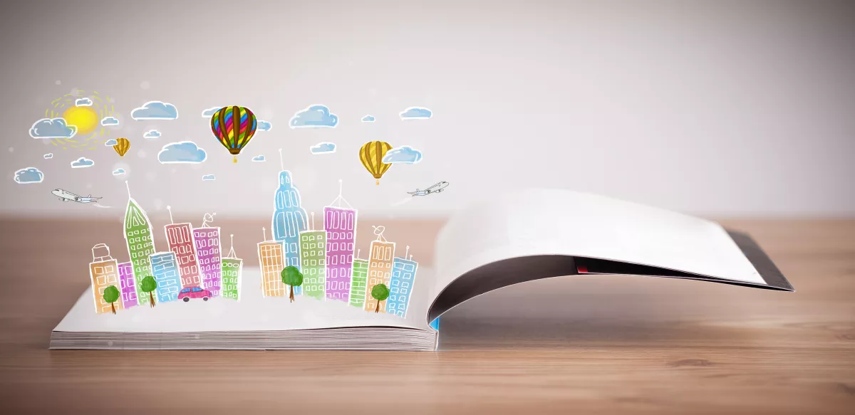 cityscape drawing on open book