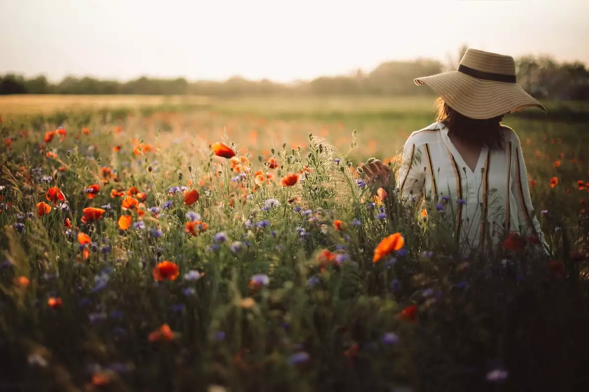 Stylish,Woman,In,Rustic,Dress,And,Hat,Walking,In,Summer