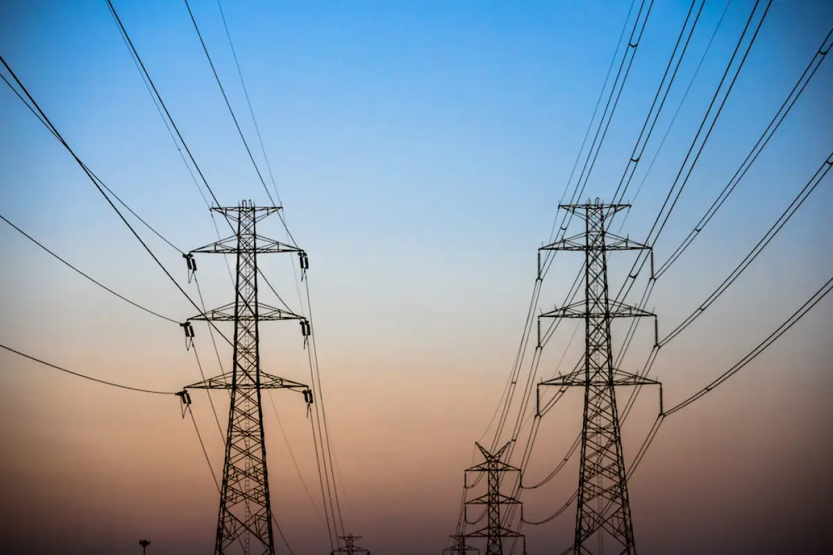 Couple Electricity pylon at sunset