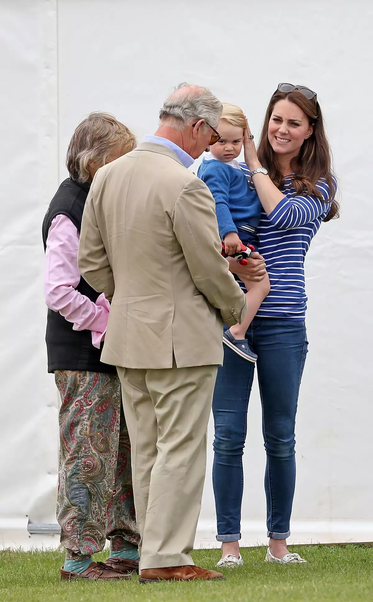 El príncipe Carlos, Kate Middleton y el pequeño George