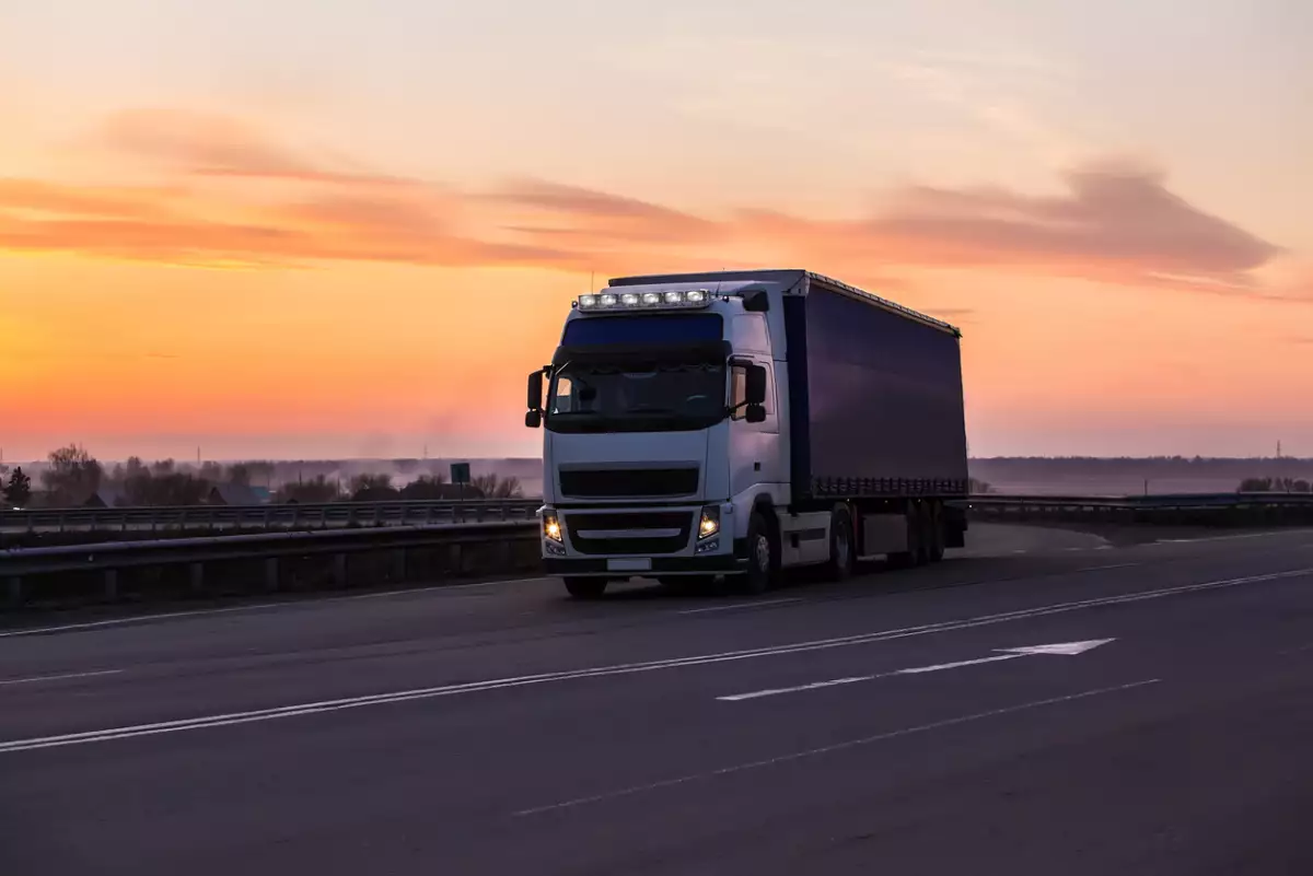 truck is moving along the highway