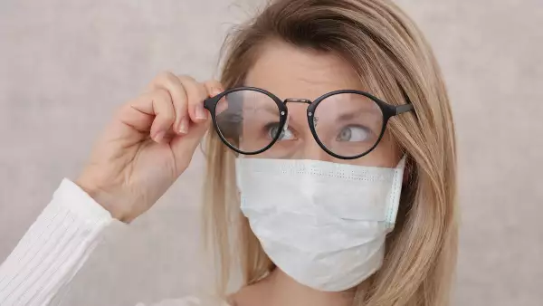 Medical mask and Glasses fogging. Avoid face touching, Coronavirus prevention, Protection.