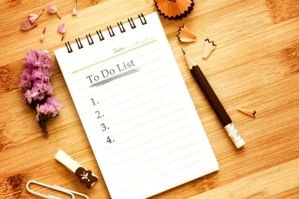 paper notepad book with pencil