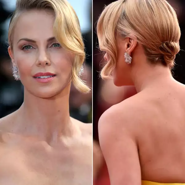 Es imposible dejar de ver a Charlize Theron. Con el pelo en un estilo muy french glam, la actriz llevó labios rosa pálido y poca sombra acentuando el increíble peinado.