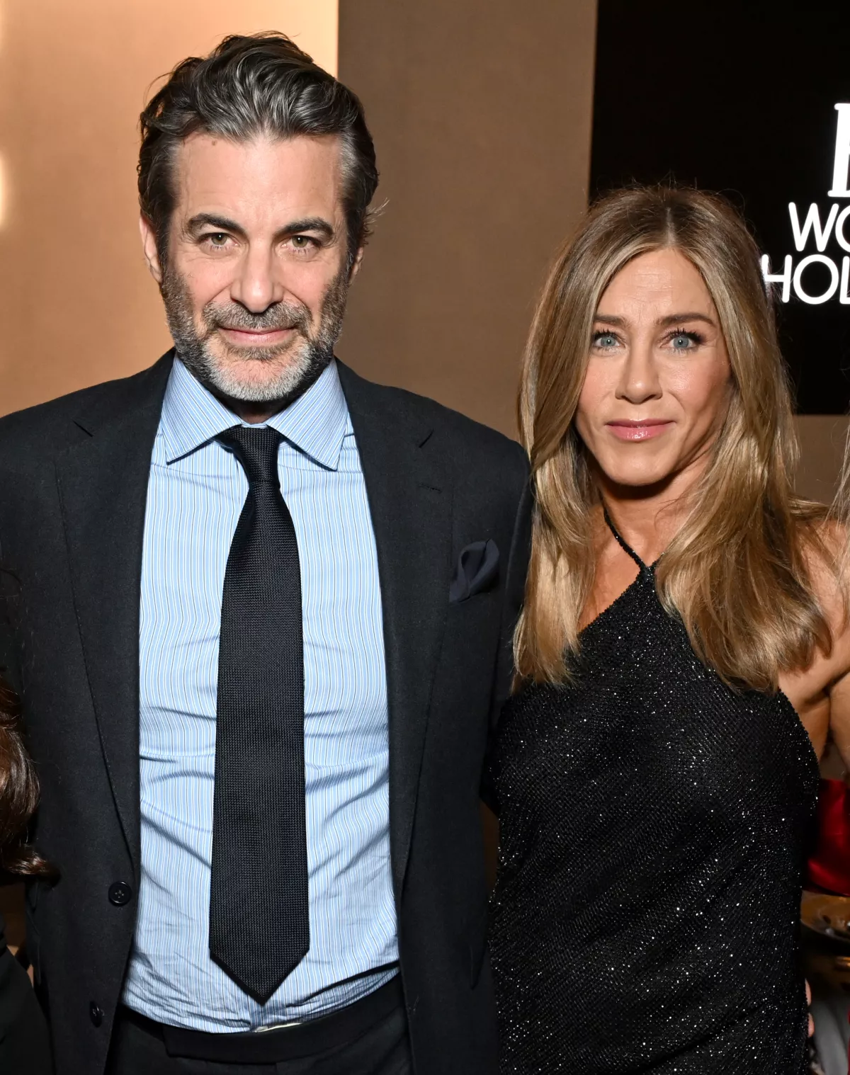 Jim-Curtis-Jennifer-Aniston-alfombra-