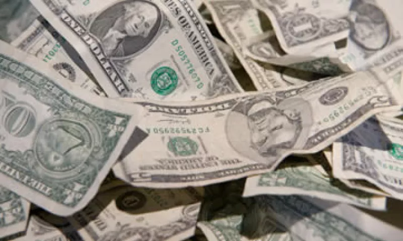 El tipo de cambio es de 12.7988 pesos para solventar obligaciones en moneda extranjera. (Foto: Getty Images)