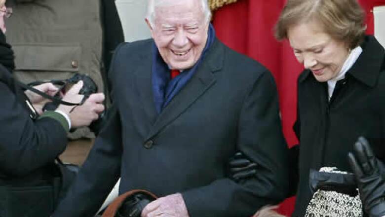 El ex presidente Jimmy Carter y su esposa Rosalynn, al momento de llegar a la asunción de Obama.
