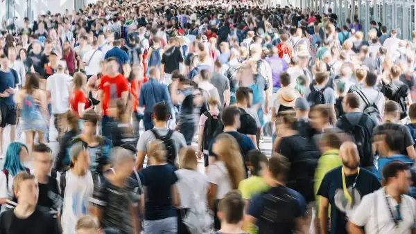 crowd of people at a trade fair