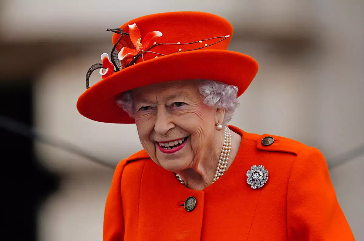 The Queen's Baton Relay At Buckingham Palace