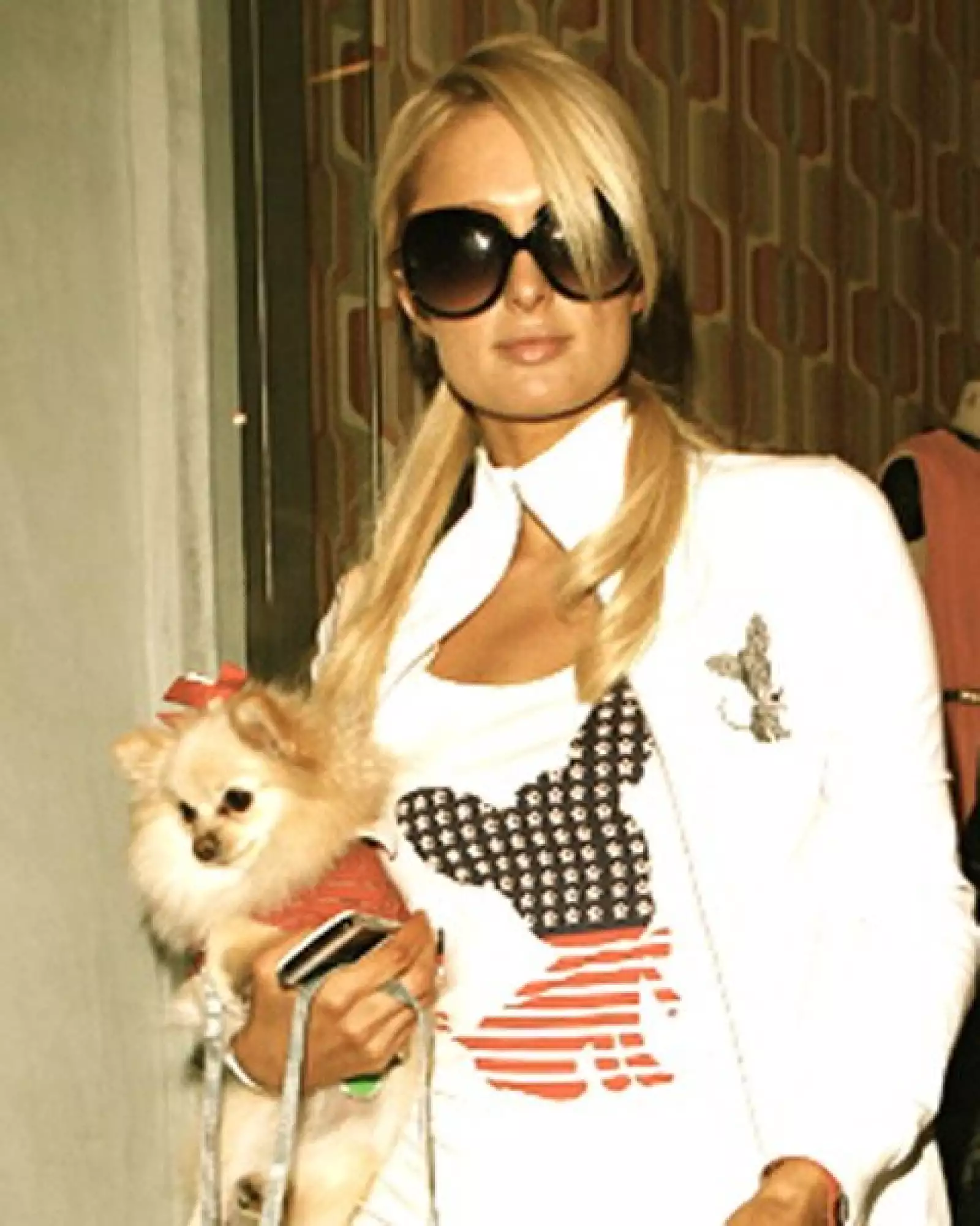 Paris Hilton: Incluso Marilyn Monroe Jr. utiliza artículos de mi línea de ropa `Little Lily´. Siempre tiene que estar coordinada con su mamá. ;)