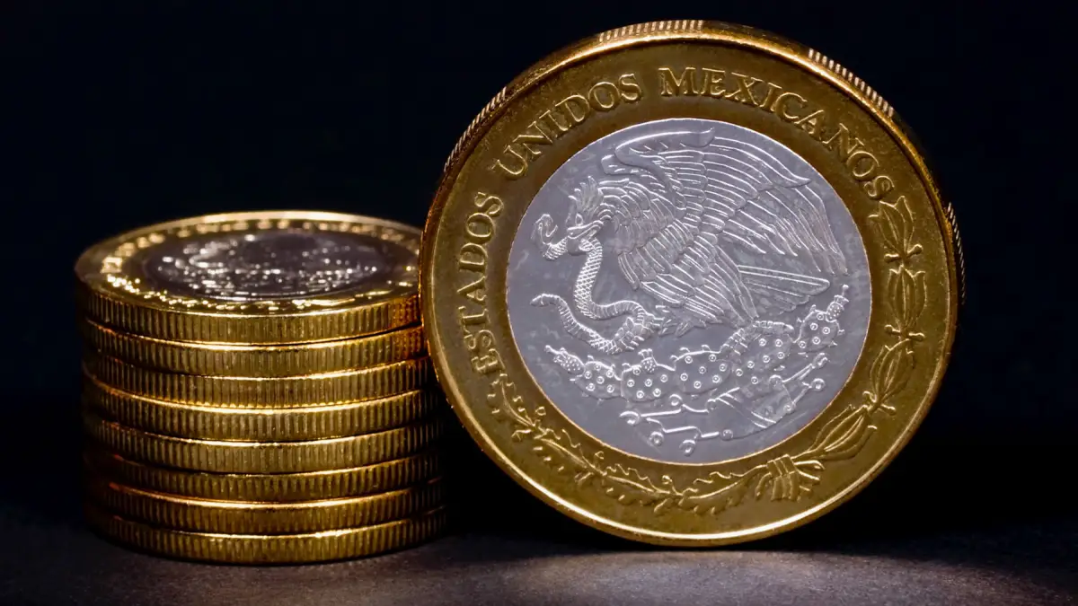 Peso y dólar