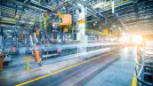 robots welding in a car factory