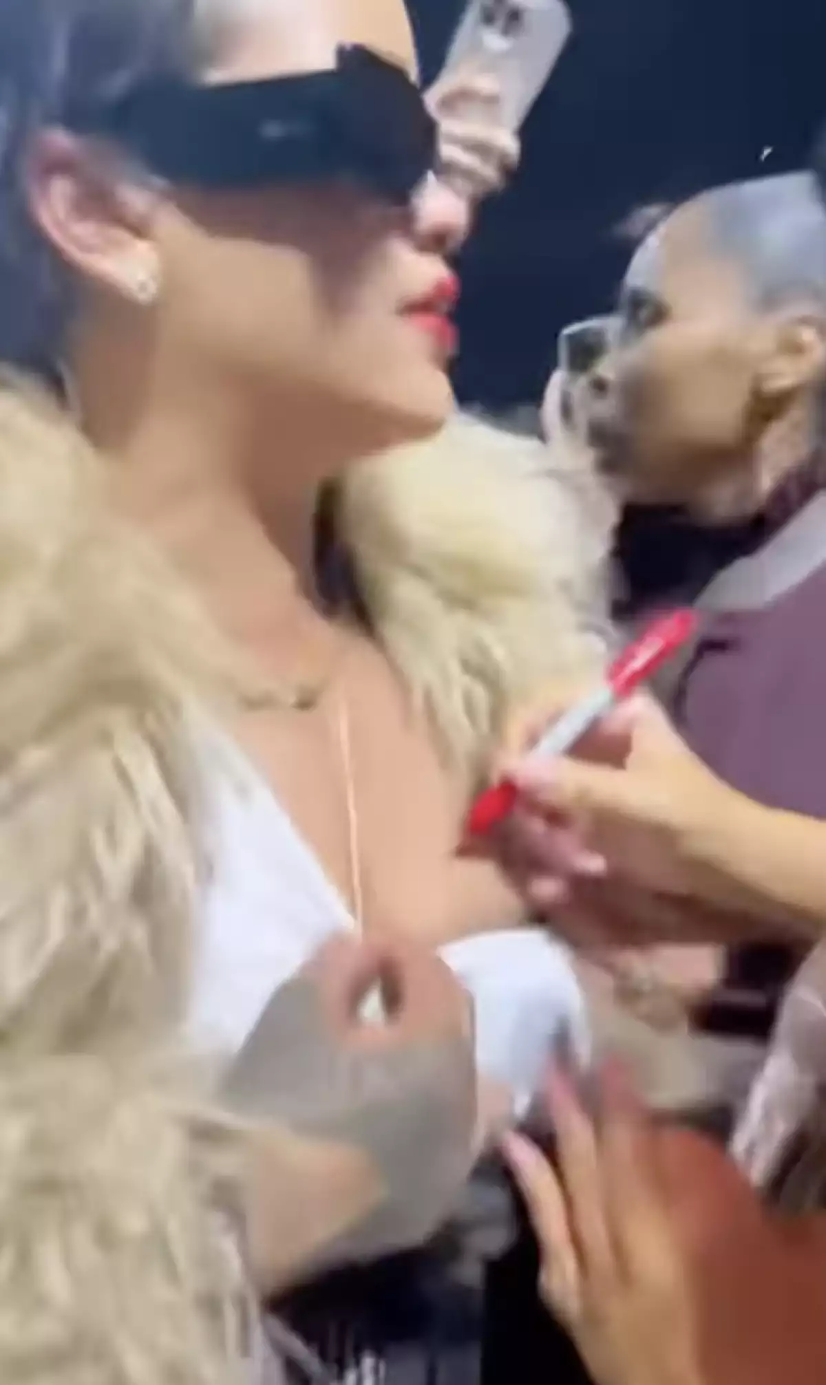 Mariah Carey Rihanna autógrafo