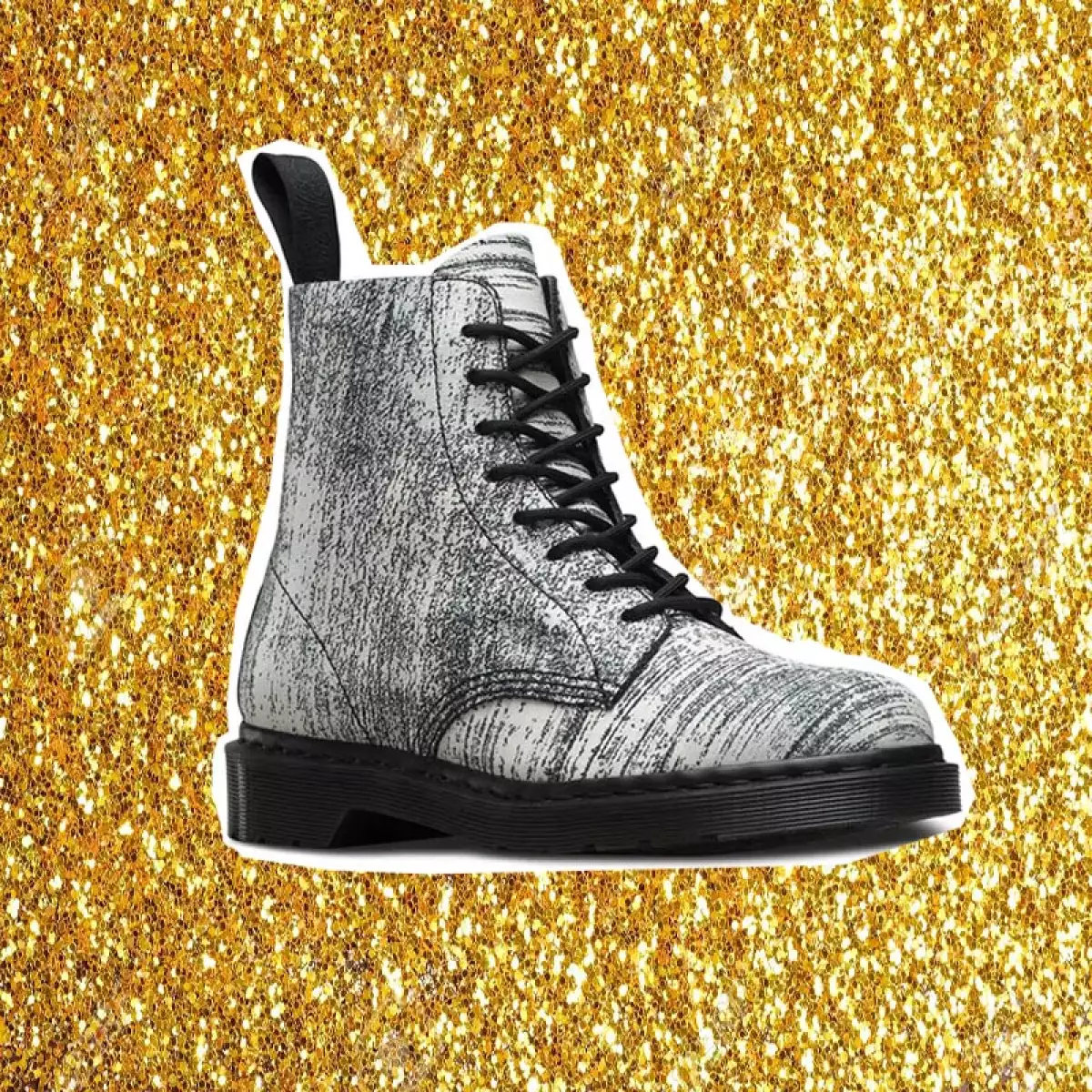 Sprinkle glitter gold dust on a black background with copy space