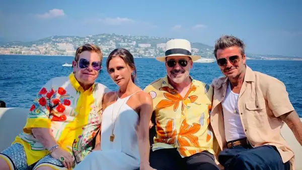 Los Beckham y Elton John