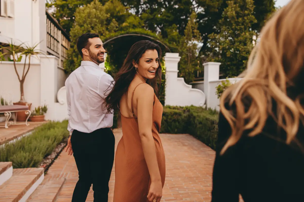 Young,Couple,Arriving,At,Their,Retreat,Destination.,Happy,Young,Couple