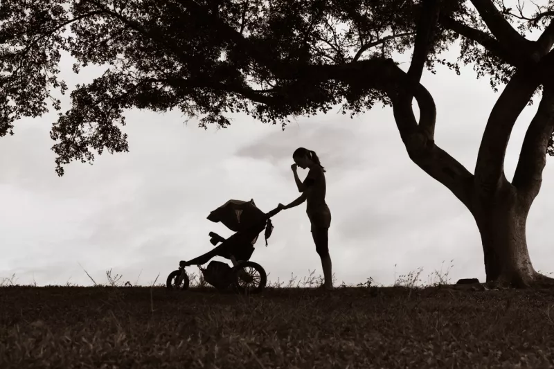 Tired mother suffering from post natal depression.