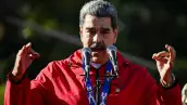 El presidente de Venezuela, Nicolás Maduro, habla durante una marcha para conmemorar el "Día de la Resistencia Indígena" en Caracas el 12 de octubre de 2025. El domingo, el presidente venezolano Nicolás Maduro llamó a la líder de la oposición María Corina Machado de bruja demoníaca, dos días después de que ella recibiera el Premio Nobel de la Paz (Imagen principal del artículo web "El Nobel de la Paz a Machado profundiza el aislamiento de Maduro en la arena internacional"). 