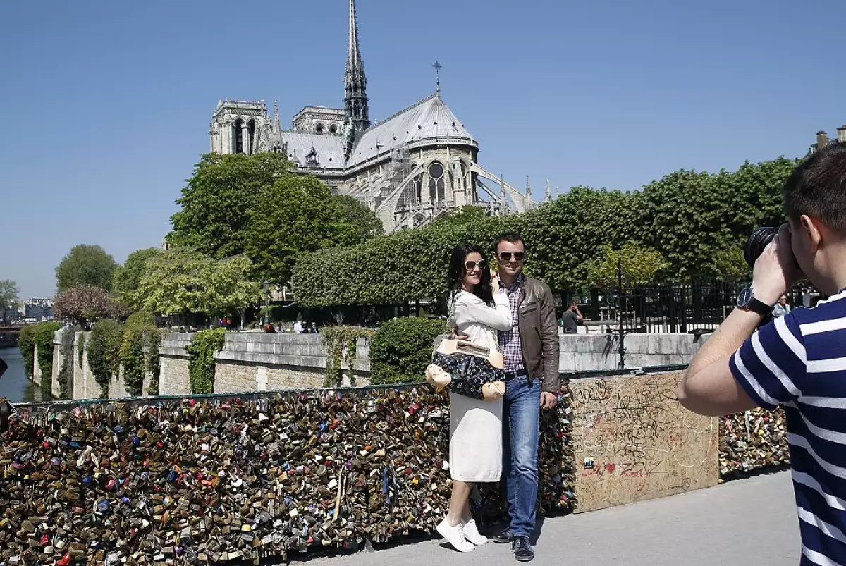 Tourists Visit Notre-Dame De Paris