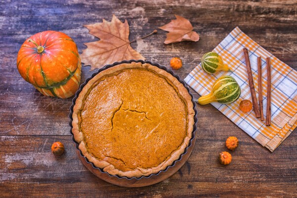 Pumpkin pie at rustic table