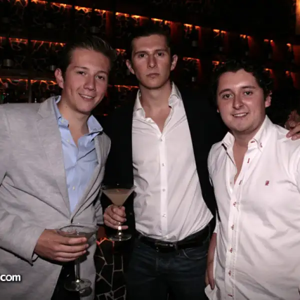 Ricardo y Alberto Martínez con Diego González