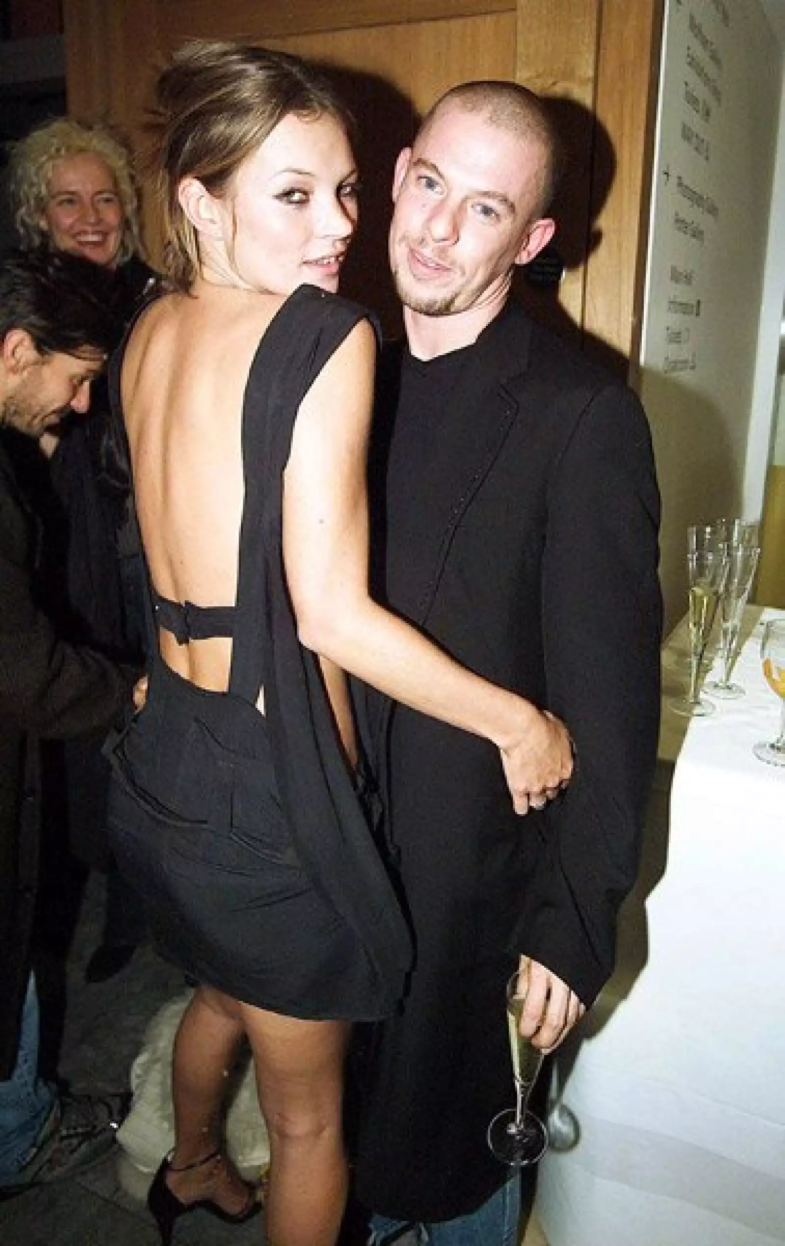 Con la top model Kate Moss en 2002 durante una fiesta de Mario Testino.